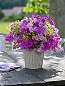 Bouquet of geranium (cranesbill), dianthus (carnations) and alchemilla