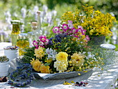 Freshly picked medicinal herbs on metal tray