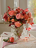 Autumn bouquet with Rosa 'Amelia' (Roses), Parthenocissus (Wild Vine)