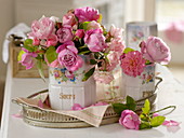 Pink (roses) in grandma's porcelain tins on metal tray