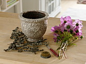 Arrangement with decorative basket and lichen-covered branches (1/5)