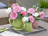 Timeless bouquets made of gerbera, dianthus (clove) and eucalyptus