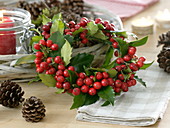 Small wreath of holly with red berries