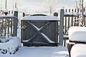 Garden gate in the snow