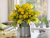 Yellow bouquet from Acacia, Tulipa, Narcissus 'Tete a Tete'