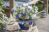 Blue and white early summer bouquet: Campanula persicifolia (bellflowers)