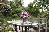 View from the terrace into garden with Rosa (roses)