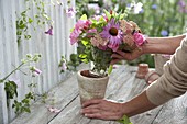 Bouquet of herbs in a clay pot (1/2)