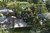 White and yellow patio on wooden deck