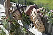 Chip baskets and clay pots by the farm garden fence