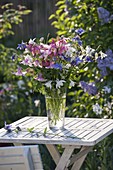 Bouquet of Aquilegia (columbine) in glass vase