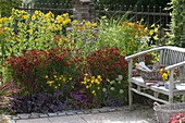 Yellow-red terrace bed with perennials