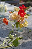 Small bouquet of Rosa (roses), Tropaeolum (nasturtium) and Malus