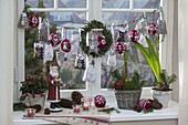 Advent calendar with grey bags and knitted Christmas balls