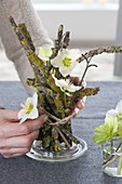 Unusual standing bouquet with lichen-covered branches