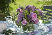 Small bouquet of Allium christophii, Rosa