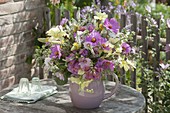 Pink-yellow bouquet of cosmos (jewel basket), lavatera (mallow)