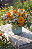 Orange-white bouquet with marigolds