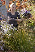 Woman picking the last flowers for a bouquet