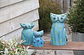 Hand-potted blue cat family