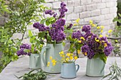 Violet syringa (lilac) and ranunculus acris bouquet