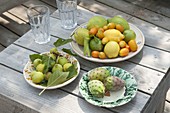 Freshly picked mediterranean fruits on pottery-