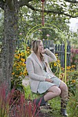 Hanging chair on apple tree