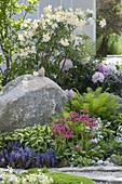 Front yard with perennials and natural stones