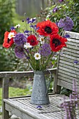 Bouquet in zinc-pot on garden bench-Papaver orientale