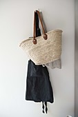 Shopping bag and apron on a hook
