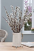 Salix (kitten pasture) bouquet in white jug