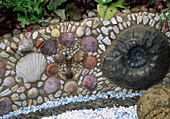 Detail of SHELL & Fossil RAISED BORDER. Warren Farm CENTRE'S 'THE Essence of LIFE' COURTYARD Garden DESIGNED by ROSAMOND PAGE. CHELSEA