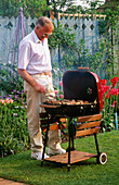 Graham NICHOLS at THE BARBECUE IN THE NICHOLS Garden, READING