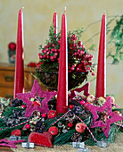 Advent wreath. Twisted wreath of clematis and millbeckia vines and silk pine.