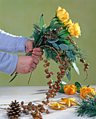 Advent bouquet: 1. Step. Tie date twigs into the bouquet