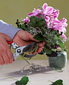 Tying an autumn bouquet: Step 2. Cut off the stems of the tied bouquet.