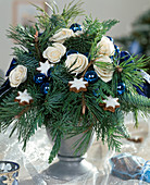 Christmas bouquet with silk roses, pine, fir and cypress branches