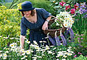 Woman picking flowers