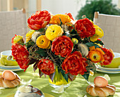 Easter table decoration - bouquet with tulips, ranunculus (ranunculus)