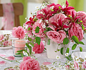Pink roses, Clematis flowers, Gypsophila (Gypsophila)