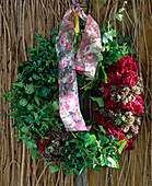Wreath of hedera (ivy), box, oregano, dried paeonias