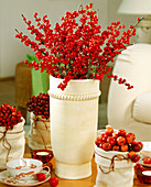 Bouquet of Ilex branches, Malus ornamental apple and rosehip rose