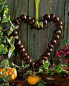 Door wreath, chestnut heart on wire threaded
