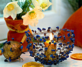 Silver wire lantern and lapis lazuli, Helleborus (Christmas rose)