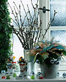 Winter window with barbara branches, Euphorbia 'Fantasiestern