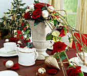 Arrangement of red roses, Hedera ivy, Viburnum snowball, tree balls