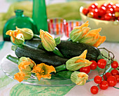 Courgettes and courgette flowers, tomato vine