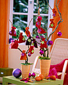 Self made Advent calendar, branches in orange vases