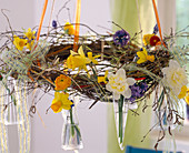 Wreath with single flowers of Narcissus (narcissus), Ranunculus