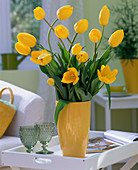 Tulipa 'Yokohama' (long-stemmed yellow tulips) in yellow vase